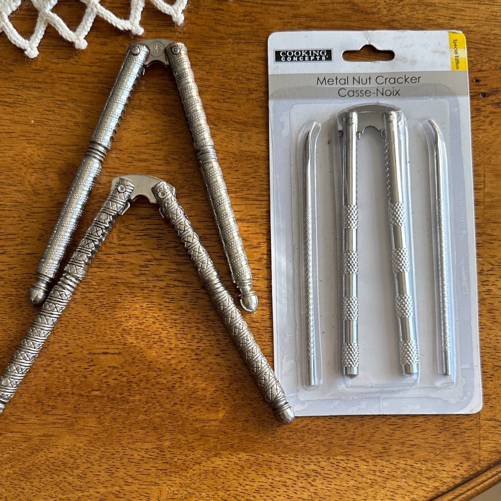 Three Silver Metal Nut Crackers